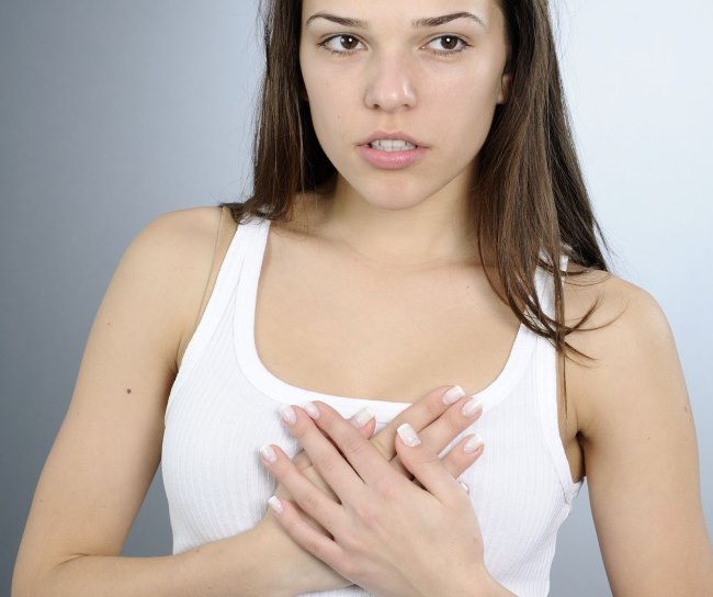 An 8-year-old girl has one swollen breast.  Why does a teenage girl have chest pain?